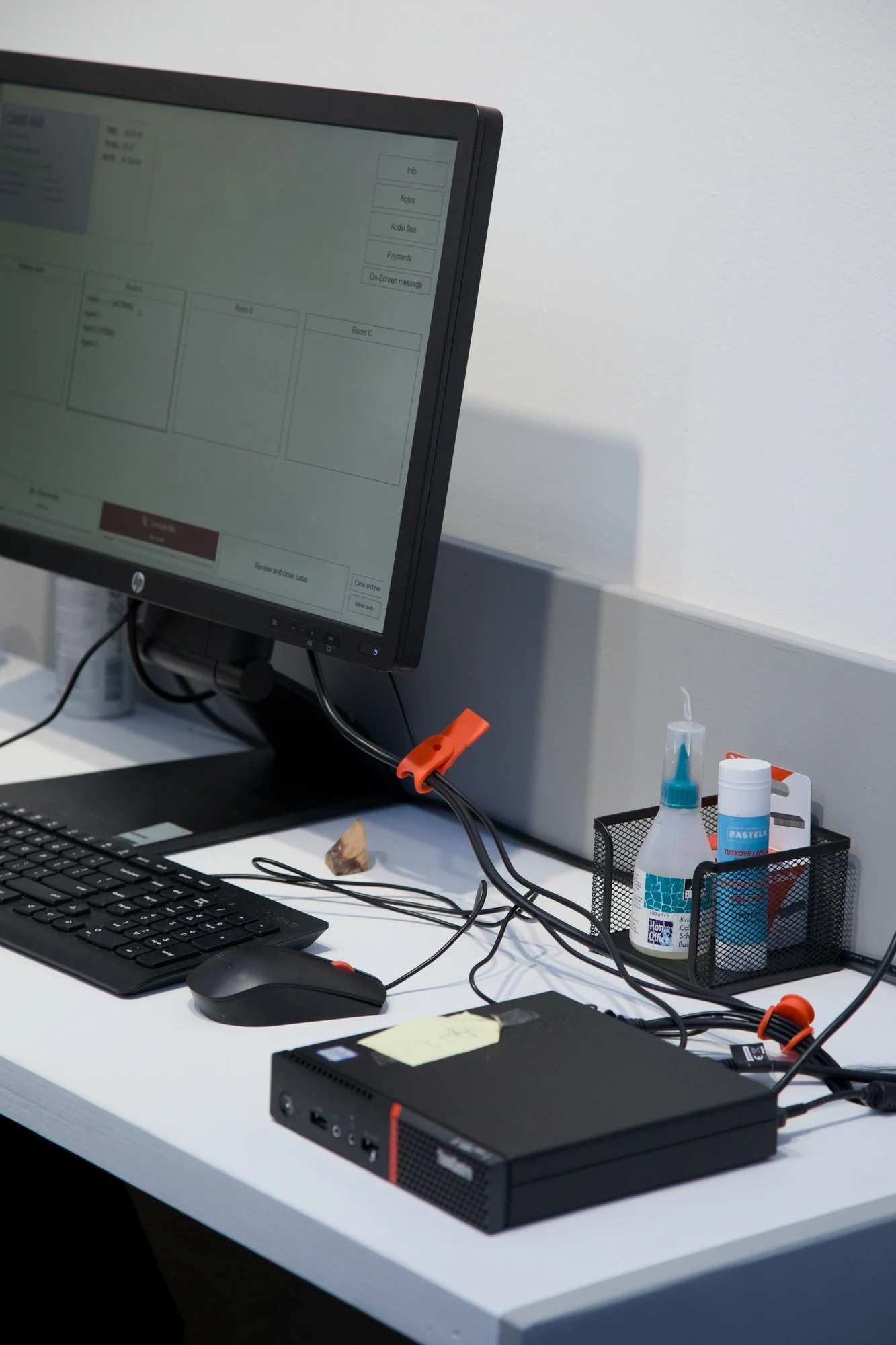Close view of an agent’s workstation and call equipment.